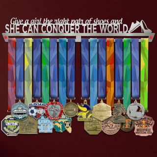 Give A Girl The Right Shoes Medal Hanger holding a full row of medals on a wall