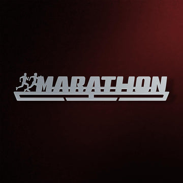 Marathon Medal Hanger in laser-cut steel on a dark background