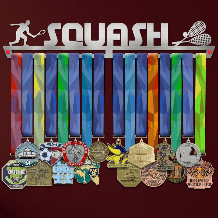 Squash Medal Hanger holding a full row of medals on a wall